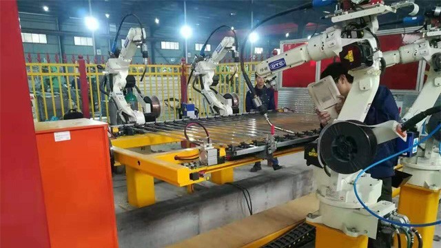 為什么說企業(yè)使用焊接機器人的價值大于焊接工？